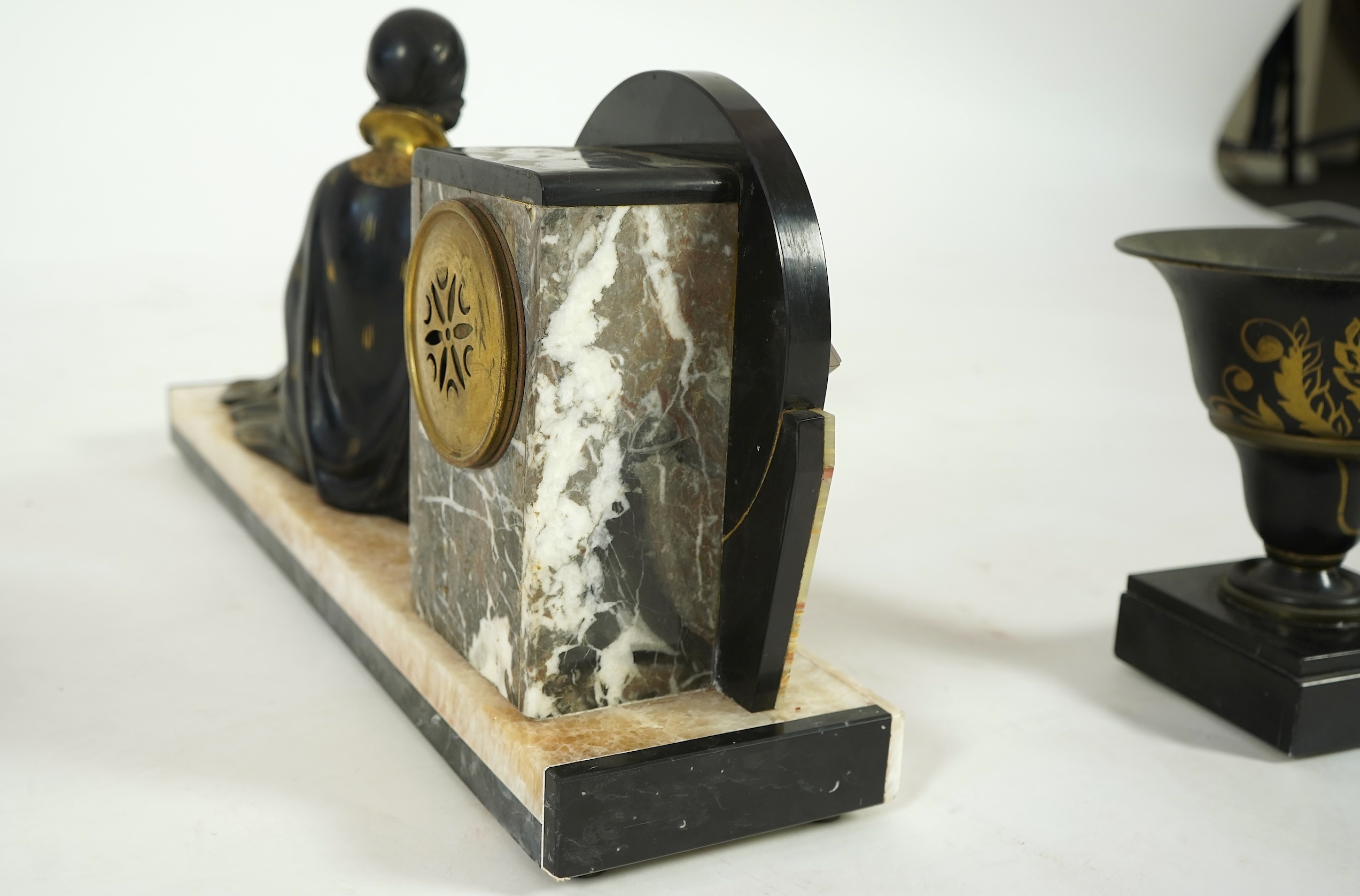 Attributed to Uriano (Ugo Cipriani, Italian, 1897-1960), a French Art Deco marble clock garniture